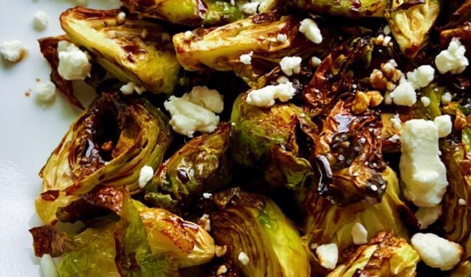 Tasty, crispy, sweet, and tangy air fryer Brussels sprouts are cooked in the air fryer, drizzled with balsamic glaze, aka balsamic reduction, and finally topped with creamy goat cheese. These Brussels sprouts are crunchy, still tender inside, and crispy outside. That balsamic glaze gives this air-fried Brussels sprouts a sweet and tangy taste, while the goat cheese adds the perfect level of creaminess. This dish is the perfect appetizer or side dish for any night of the week. Also, it will impress guests as a holiday dinner.