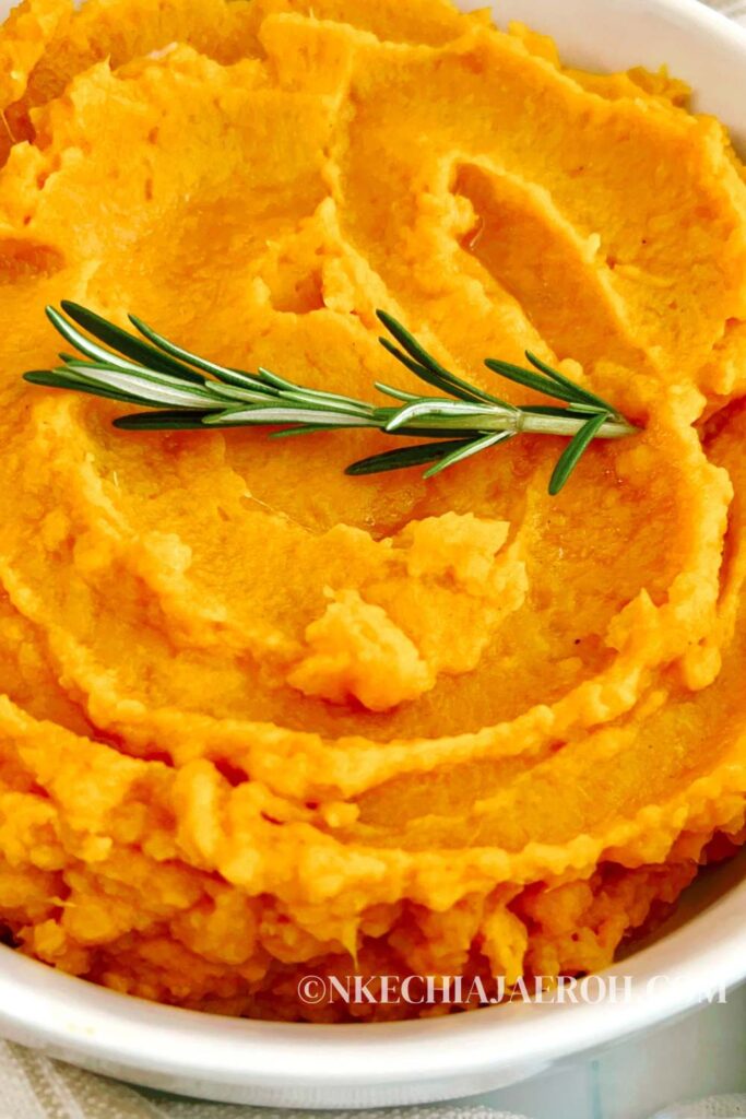 A simple vegan mashed sweet potatoes recipe with rosemary, coconut milk, and coconut cream is tasty, creamy, fragrant, and sweet, making a perfect side dish for any main. Vegan mashed potatoes is ideal for family dinners or special occasions. Made without any dairy, they still come out dreamy, creamy, and full of that sweet and savory flavor! The secret to making dairy-free mashed sweet potatoes without milk and butter is to use coconut milk and coconut cream. Mashed sweet potatoes recipe is perfect during Thanksgiving and Christmas, etc.
