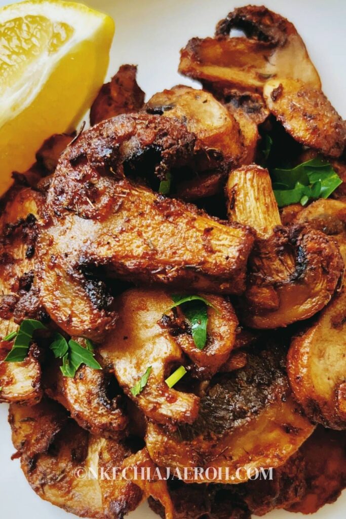 A simple recipe of air fryer mushrooms requires sliced mushrooms, paprika, olive oil, onion powder, garlic powder, dry thyme, salt, and pepper! Making mushrooms in your air fryer is the easiest way to make mushrooms. It takes only a few minutes, resulting in the best tasting mushroom ever! You can add sliced air-fried mushrooms to salads and bowls or use them as appetizers or snacks. This easy salt and pepper sliced air fryer mushroom recipe with paprika is vegan and perfect for non-meat eaters and vegetarians!