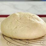 Basic pizza dough requires some flour, yeast, and lukewarm water. I have a few other ingredients in there, but I'm willing to bet you already have them in your kitchen. Instead of buying ready-made pizza dough with preservatives and additives, you can make it fresh, and it will taste even better. Do you love pizza but worry it's too hard to make from scratch? I will show you how simple it is with my easy homemade pizza dough. This is the simplest and quickest homemade pizza dough recipe!