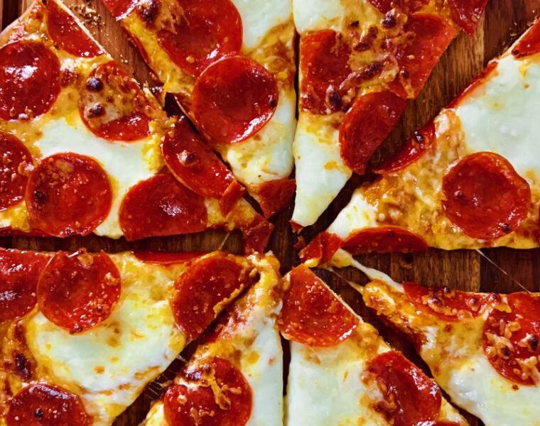 An easy recipe of homemade thin crust pizza is quick to make, healthier, has fewer calories, and is perfect for family pizza night! Thin crust pizza is also called slim/skinny pizza! If you are ready to enjoy a wholesome pizza without a hefty calorie price and yet with all the flavors and ingredients, a thin-crust pizza recipe is what you need. Homemade thin crust pizza recipe has an excellent carbohydrate-protein-fat ratio, unlike thick crust/deep dish pizzas. Pizzas have bad wraps, but not this thin crust pizza! Unlike those bulky, thick pizza slices, the thin/skinny crust pizza is light, flaky, and enjoyable.