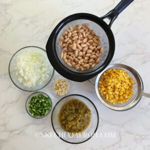 prep the ingredients by washing and chopping the onion, garlic, and jalapeno.