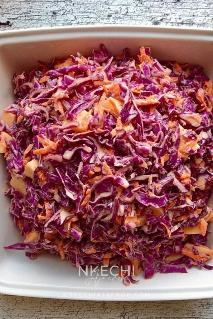 Here's the easiest and tastiest cabbage carrot apple salad you and your family will enjoy! Everyone needs that quick go-to salad that is perfect at any time of the year and can go with anything! Today, I want to share my cabbage carrot apple slaw. This easy red cabbage salad recipe requires only three main ingredients, namely red or purple cabbage, carrots, and apple, and then you add the dressing. And you are left with a tasty, refreshing light salad! This super easy and nutritious red/purple cabbage salad is the perfect effortless side dish that will go with any main dish.