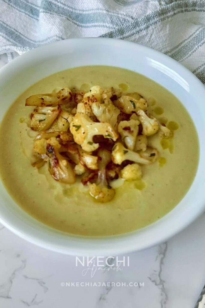 Creamy roasted cauliflower soup is a perfect hearty soup recipe for every family member! Not only is cauliflower soup easy to make, but it requires only a few ingredients – cauliflower, onions, garlic, ginger, fresh thyme, chicken broth, and coconut milk! This soup is nutritious, healthy, and ideal for anyone on a special diet! This gluten-free and dairy-free roasted cauliflower soup is a flavorful, hearty soup that is excellent for fall and winter nights. Cheers to enjoying the most satisfying, cozy, tasty, flavorful cauliflower soup EVER! 