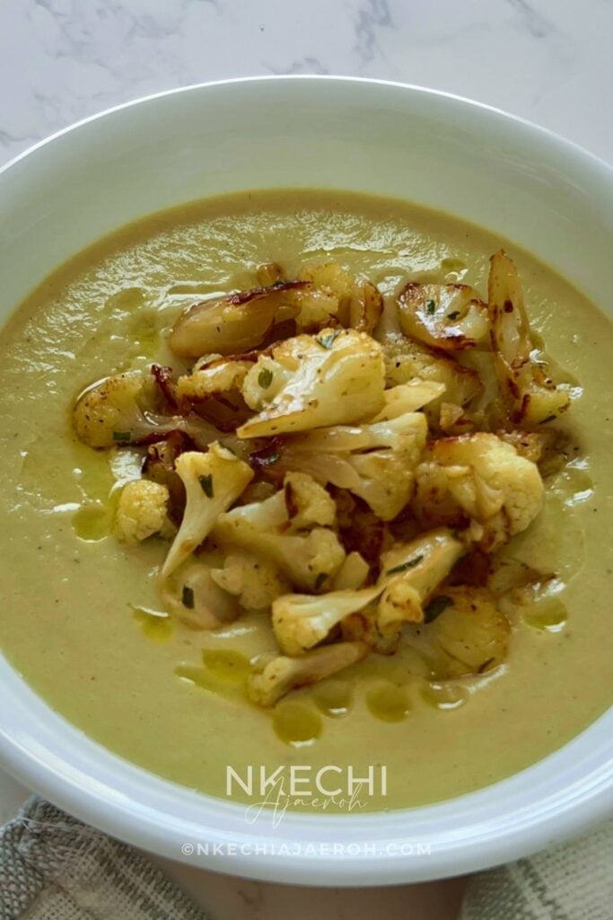 Creamy roasted cauliflower soup is a perfect hearty soup recipe for every family member! Not only is cauliflower soup easy to make, but it requires only a few ingredients – cauliflower, onions, garlic, ginger, fresh thyme, chicken broth, and coconut milk! This soup is nutritious, healthy, and ideal for anyone on a special diet! This gluten-free and dairy-free roasted cauliflower soup is a flavorful, hearty soup that is excellent for fall and winter nights. Cheers to enjoying the most satisfying, cozy, tasty, flavorful cauliflower soup EVER!