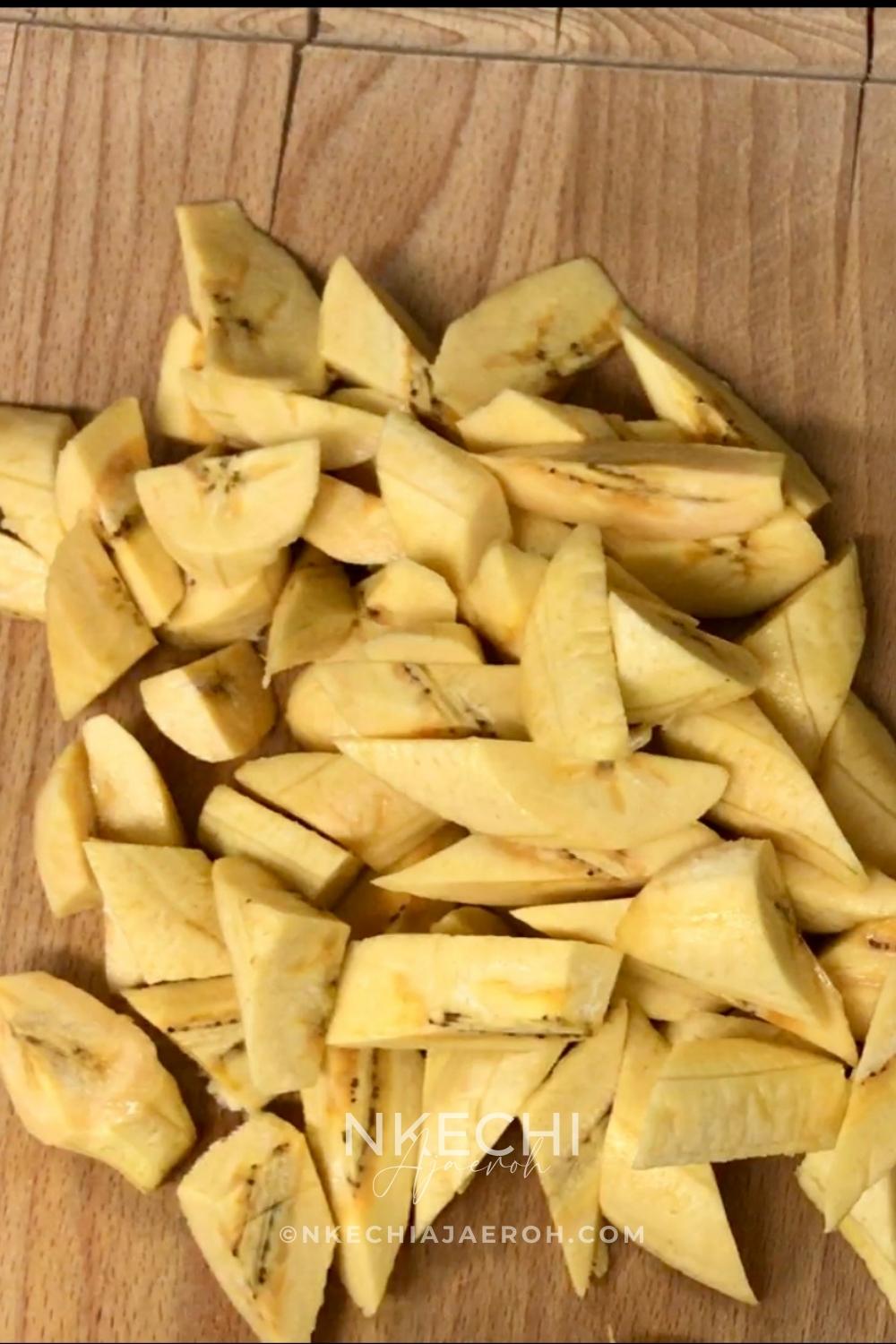 Peel and cut the plantains. Typically, I wash my plantains before peeling, so if you wish to wash them as I do, then go ahead and do so. Next, peel the plantains and cut them as desired. To be honest, you can cut the plantains any way you wish. If you need help figuring out how to cut your plantains for kelewele, look at my photos (below) to see the shape of the plantains. You can also simply cut the plantains into cubes. Also, watch my video for the tutorial. Additionally, peel the onion and set aside.