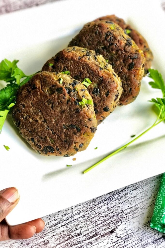 Healthy Black Bean Burger Lettuce Bun Recipe is Gluten-Free, tasty and nutritious! Want a healthy vegetarian burger that doesnโt skimp on flavor? This nutritious black bean veggie burgers recipe is what you need. If you have ever wondered how to make tasty vegetarian burgers, wonder no more. This black bean veggie burger recipe is quick and easy to follow. Not only easy to make, this is perfect for beginner chefs and packed with healthy and nutritious ingredients that your body will love. This wholesome vegetarian burger is what you need for your next meal prep. This veggie burger is gluten-free, vegetarian, and lower in calories and saturated fats than its meat burger counterparts. This makes the perfect recipe for backyard BBQ, picnics, Memorial Day, and Fourth of July. If ready, letโs make this easy black bean burger from scratch and serve it on a lettuce bun!