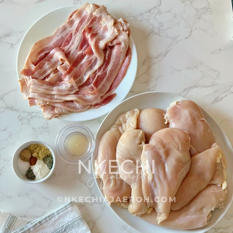 7 chicken Breasts (adjust as needed)
1 pack of bacon (typically about 15 strips inside)
1 TBS apple cider vinegar
1 TBS Olive oil
2 tsp onion powder
2 tsp paprika
1 + 1/2 tsp Knorr Bouillon
3/4 tsp salt
1 tsp ground ginger
3/4 tsp dry thyme
1/2 tsp ground black pepper
1/2 tsp cayenne pepper
Couple leaves of parsley (for garnishing)