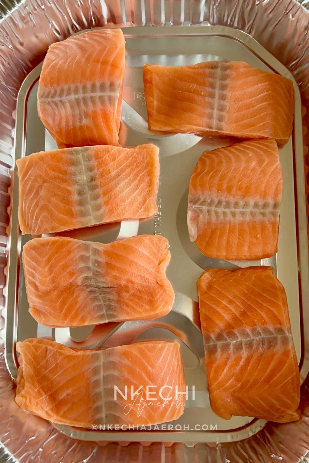 This simple oven-baked buttery honey mustard salmon recipe is first seasoned with the honey mustard sauce and then baked to perfection. These salmon are tasty, flaky, and buttery, and not to mention that they are super easy to make and require no expertise! I have several salmon recipes on the blog, including air fryer and pan-seared salmon. However, this oven-baked buttery honey mustard salmon is our favorite. The butter, honey, and mustard are used to make this recipe unique. These will be your favorite, too! This oven-baked salmon recipe is ideal for meal prepping and can be versatile and great for special occasions.