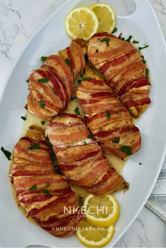 Here is how to make the most delectable oven-baked bacon wrapped chicken breasts recipe without brown sugar. This juicy and nutritious chicken recipe is easy, tasty, and such a crowd-pleaser! Bacon-Wrapped Chicken Breasts is kid-friendly as most kids love everything bacon! The ingredients for oven-baked bacon wrapped chicken breasts are simple. First of all, the chicken is well seasoned and then wrapped with bacon, protecting them from over-drying. In the end, you are left with juicy, tasty chicken breast that you can serve with any side dish.