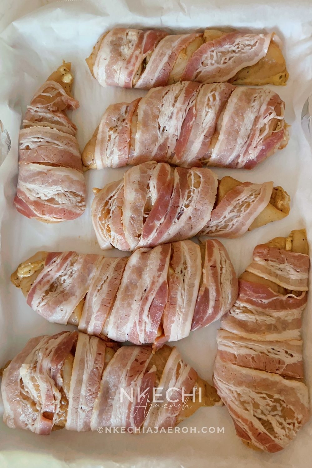 Here is how to make the most delectable oven-baked bacon wrapped chicken breasts recipe without brown sugar. This juicy and nutritious chicken recipe is easy, tasty, and such a crowd-pleaser! Bacon-Wrapped Chicken Breasts is kid-friendly as most kids love everything bacon! The ingredients for oven-baked bacon wrapped chicken breasts are simple. First of all, the chicken is well seasoned and then wrapped with bacon, protecting them from over-drying. In the end, you are left with juicy, tasty chicken breast that you can serve with any side dish.