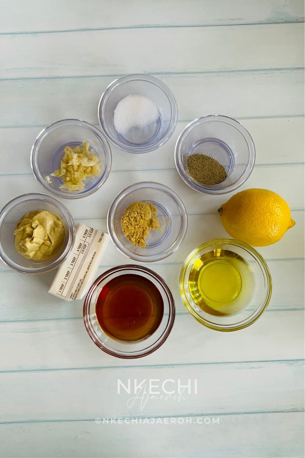 Combine the Seasonings. Put all the seasoning ingredients – salt, pepper, Knorr, grated garlic, Dijon mustard, and honey, into a bowl. Melt your butter and olive oil in the microwave, then add them to this seasoning bowl. Mix everything well and set it aside.