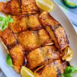 Sweet, savory, tasty, and easy-to-make buttery, flaky oven-baked honey-mustard salmon is the salmon recipe you need. This will be your new bestie's go-to quick dinner meal. You can serve it with braised red cabbage, fried rice, and whatever you want, LOL. Please say hello to this delicious salmon that will make you smile!