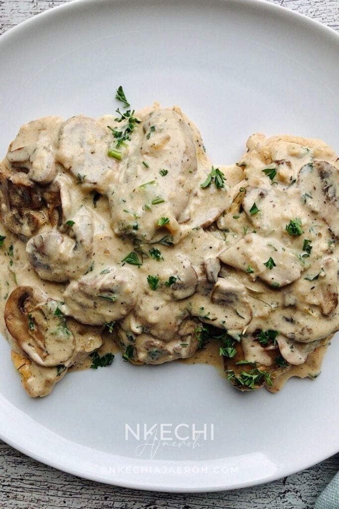Can we take a moment to rave about this flavorful, finger-licking, good, and satisfyingly delicious creamy mushroom chicken breast recipe? This chicken dinner recipe is a win-win situation. Packed with nutritious ingredients and smothered in creamy, garlicky sauce. This is one restaurant-quality food you and your family will enjoy. It is a versatile recipe that is perfect for Sunday dinner, holidays, and still easy for weeknight meals. Need to break free from the same old dinner rotation items? Turn your chicken dinner into a culinary masterpiece with my creamy garlic mushroom chicken breast recipe. Easy enough for any night of the week, yet delicious enough for Sunday dinners and entertaining your guests. 