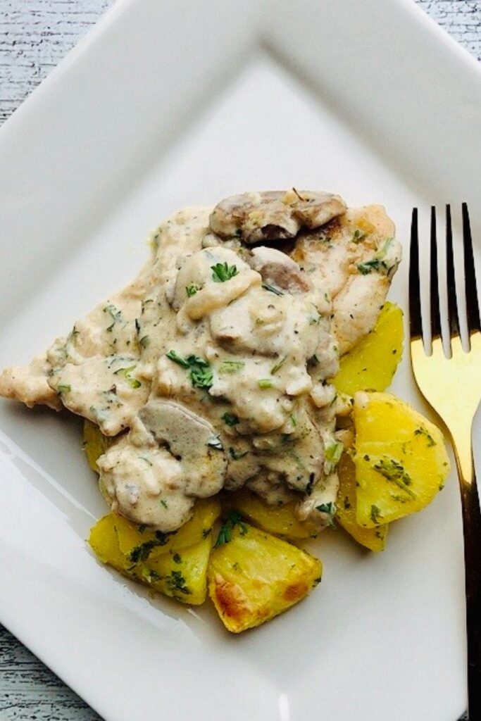 Can we take a moment to rave about this flavorful, finger-licking, good, and satisfyingly delicious creamy mushroom chicken breast recipe? This chicken dinner recipe is a win-win situation. Packed with nutritious ingredients and smothered in creamy, garlicky sauce. This is one restaurant-quality food you and your family will enjoy. It is a versatile recipe that is perfect for Sunday dinner, holidays, and still easy for weeknight meals. Need to break free from the same old dinner rotation items? Turn your chicken dinner into a culinary masterpiece with my creamy garlic mushroom chicken breast recipe. Easy enough for any night of the week, yet delicious enough for Sunday dinners and entertaining your guests. 