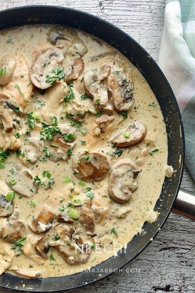 Can we take a moment to rave about this flavorful, finger-licking, good, and satisfyingly delicious creamy mushroom chicken breast recipe? This chicken dinner recipe is a win-win situation. Packed with nutritious ingredients and smothered in creamy, garlicky sauce. This is one restaurant-quality food you and your family will enjoy. It is a versatile recipe that is perfect for Sunday dinner, holidays, and still easy for weeknight meals. Need to break free from the same old dinner rotation items? Turn your chicken dinner into a culinary masterpiece with my creamy garlic mushroom chicken breast recipe. Easy enough for any night of the week, yet delicious enough for Sunday dinners and entertaining your guests. 