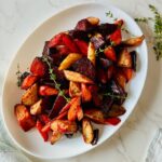 Oven Roasted Mixed Root Vegetables is a Gluten-free and Colorful Side Dish that you and your family will love! This healthy, vibrant vegetable side dish is almost hands-free! Oven-roasted mixed root vegetables recipe comprises of beetroot, carrots, and parsnips. This combination is not only stunning, colorful, and tasty but also incredibly easy to make and healthy. I love making this for most dinners that I am hosting because it adds beautiful color to the dinner table, plus most of these root vegetables are available during the fall season, so this makes a fantastic addition to your Thanksgiving and Christmas dinner table.