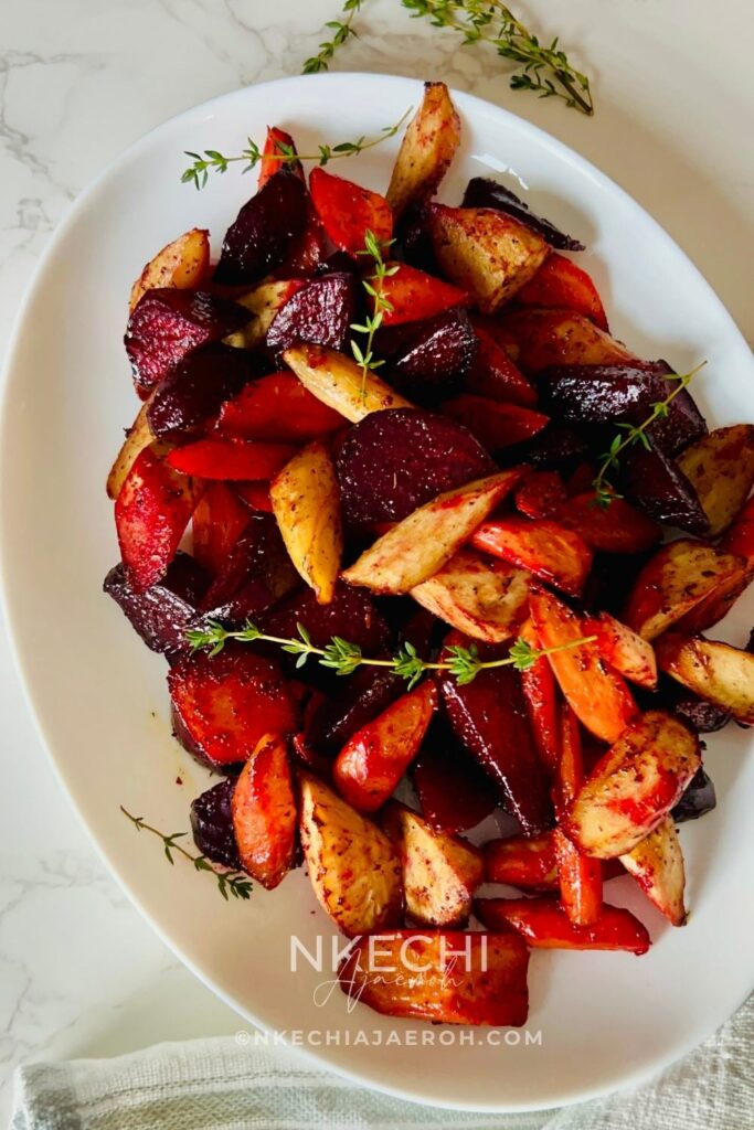 Oven Roasted Mixed Root Vegetables is a Gluten-free and Colorful Side Dish that you and your family will love! This healthy, vibrant vegetable side dish is almost hands-free! Oven-roasted mixed root vegetables recipe comprises of beetroot, carrots, and parsnips. This combination is not only stunning, colorful, and tasty but also incredibly easy to make and healthy. I love making this for most dinners that I am hosting because it adds beautiful color to the dinner table, plus most of these root vegetables are available during the fall season, so this makes a fantastic addition to your Thanksgiving and Christmas dinner table.