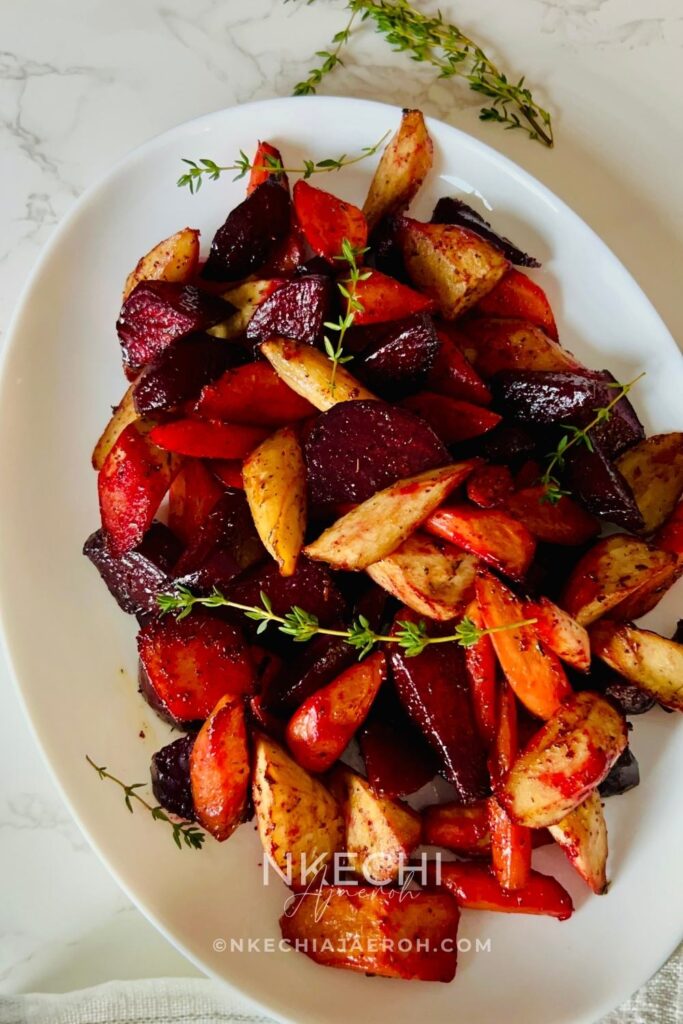 Oven Roasted Mixed Root Vegetables is a Gluten-free and Colorful Side Dish that you and your family will love! This healthy, vibrant vegetable side dish is almost hands-free! Oven-roasted mixed root vegetables recipe comprises of beetroot, carrots, and parsnips. This combination is not only stunning, colorful, and tasty but also incredibly easy to make and healthy. I love making this for most dinners that I am hosting because it adds beautiful color to the dinner table, plus most of these root vegetables are available during the fall season, so this makes a fantastic addition to your Thanksgiving and Christmas dinner table.