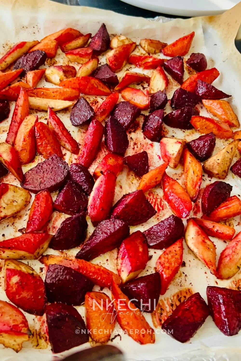 Transfer your baking sheet to the oven to roast or bake for 50 - 60 minutes. I roasted mine for exactly 55 minutes. Ensure that you turn your vegetables in between roasting for even cooking. If your oven is excessively hot, consider reducing cooking time or lowering the temperature. You do not want dried-out vegetables.