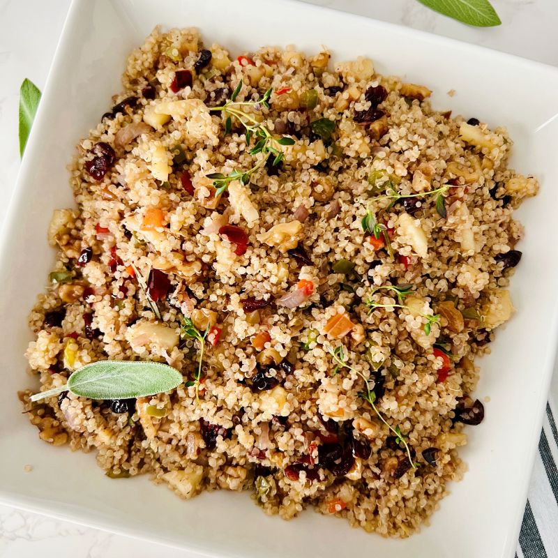 Celebrate the flavors of fall with this healthy Harvest Quinoa Pilaf — a wholesome vegan side dish made with fluffy quinoa, tart cranberries, crisp apples, and crunchy walnuts. It’s cozy, colorful, and bursting with natural sweetness and nutty flavor. Serve it as a nourishing holiday side, a hearty grain bowl, or the perfect make-ahead meal for busy weeks. Simple to make, full of texture, and beautiful on the table — this quinoa pilaf is fall comfort done right. This recipe makes for a healthy Thanksgiving, Friendsgiving, or cozy weeknight dinners.