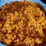 Nigerian baked coconut jollof rice is uniquely flavorful and delicious. Once you make it, you’ll find yourself coming back to it again and again. Made with parboiled rice, coconut milk, Nigerian tomato stew, homemade chicken broth, herbs, and spices, this recipe is always a hit. If you’ve never had it before, consider this your introduction to one of Africa’s finest exports — the incomparable Nigerian baked coconut jollof rice. I hope you’ll make it and enjoy it as we do, week to week and occasion to occasion. You are welcome!