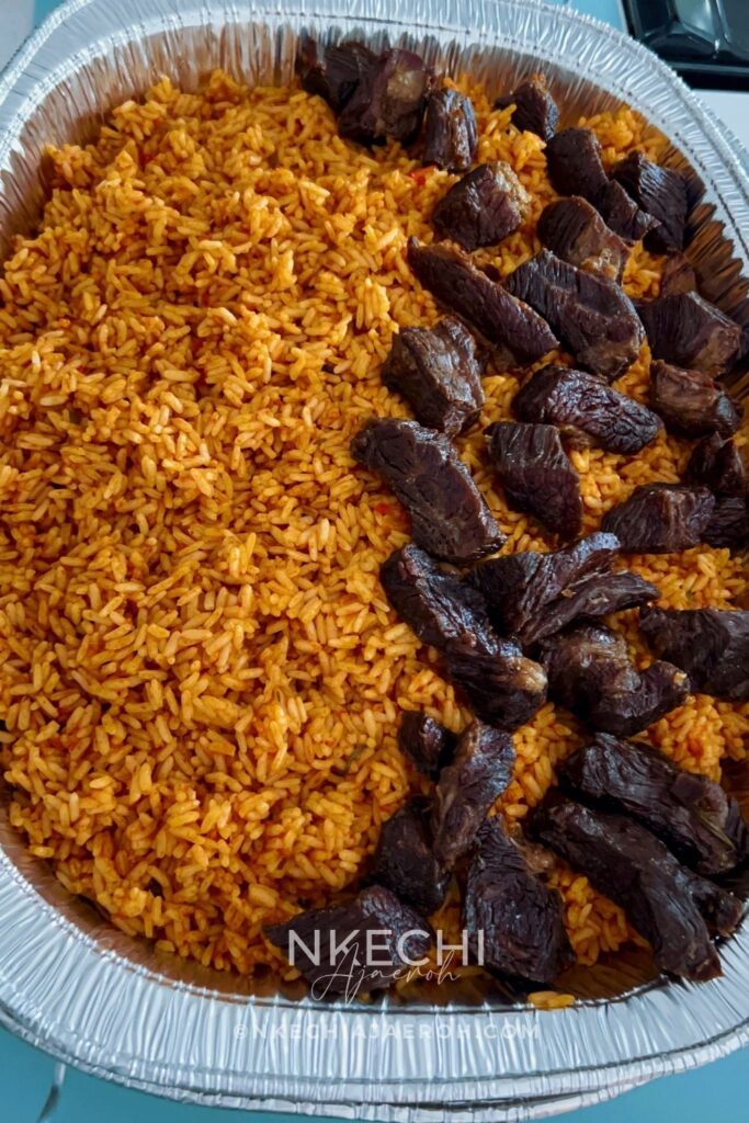 This Nigerian baked coconut jollof rice is rich, aromatic, and oven-baked for deep flavor and easy meal prep. Made with parboiled rice, coconut milk, Nigerian tomato stew, homemade chicken broth, herbs, and spices, this recipe is perfect for holidays, Sunday dinners, and freezer-friendly meals. If you love jollof rice and want a hands-off, foolproof method, this baked version is a must-try. 
If you’ve never had it before, consider this your introduction to one of Africa’s finest exports — the incomparable Nigerian baked coconut jollof rice. I hope you’ll make it and enjoy it as we do, week to week and occasion to occasion.