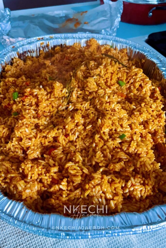 This Nigerian baked coconut jollof rice is rich, aromatic, and oven-baked for deep flavor and easy meal prep. Made with parboiled rice, coconut milk, Nigerian tomato stew, homemade chicken broth, herbs, and spices, this recipe is perfect for holidays, Sunday dinners, and freezer-friendly meals. If you love jollof rice and want a hands-off, foolproof method, this baked version is a must-try. 
If you’ve never had it before, consider this your introduction to one of Africa’s finest exports — the incomparable Nigerian baked coconut jollof rice. I hope you’ll make it and enjoy it as we do, week to week and occasion to occasion.