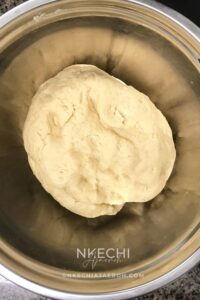 Mix thoroughly until the ingredients come together and form a dough. Gradually add water, a little at a time, until you get a firm but pliable dough. The dough should be firm but workable — not too hard and not too soft. You want a strong dough that rolls and cuts cleanly without losing its shape. Avoid adding more liquid than recommended for this recipe.