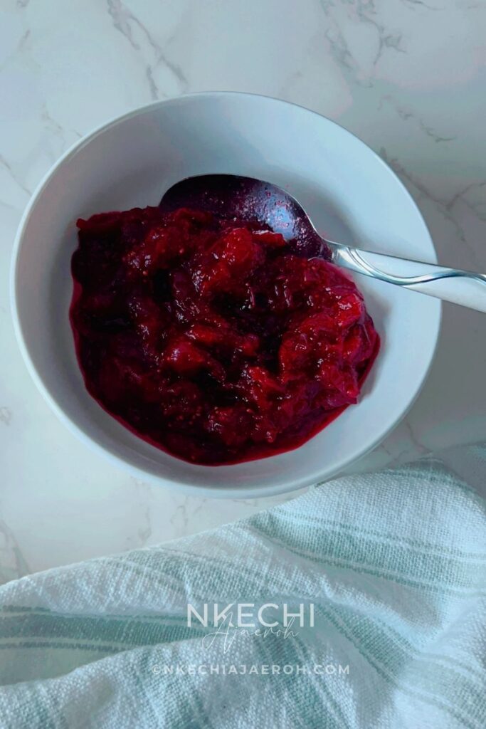 Ways to Use Leftover Cranberry Pulp
Stir Into Oatmeal or Overnight Oats. Mix cranberry pulp into warm oatmeal or overnight oats with a drizzle of maple syrup or monk fruit and a splash of almond milk. It adds tartness, fiber, and a beautiful pop of color.
Spread on Toast or Biscuits. Use cranberry pulp like a jam on toast, sourdough, or biscuits. Pair it with nut butter, cream cheese, or vegan cream cheese for a sweet-tart bite.
Toss Into Salads. Add spoonfuls of cranberry pulp to fall salads with mixed greens, roasted squash, walnuts, and a light vinaigrette. It works especially well in grain salads with quinoa or farro.
Use as a Savory Glaze. Warm the cranberry pulp slightly and spoon it over roasted turkey, chicken, or tofu. The tart cranberry flavor pairs beautifully with herbs like rosemary and thyme.