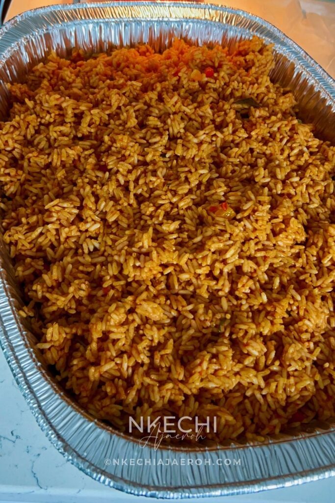 This Nigerian baked coconut jollof rice is rich, aromatic, and oven-baked for deep flavor and easy meal prep. Made with parboiled rice, coconut milk, Nigerian tomato stew, homemade chicken broth, herbs, and spices, this recipe is perfect for holidays, Sunday dinners, and freezer-friendly meals. If you love jollof rice and want a hands-off, foolproof method, this baked version is a must-try. 
If you’ve never had it before, consider this your introduction to one of Africa’s finest exports — the incomparable Nigerian baked coconut jollof rice. I hope you’ll make it and enjoy it as we do, week to week and occasion to occasion.
