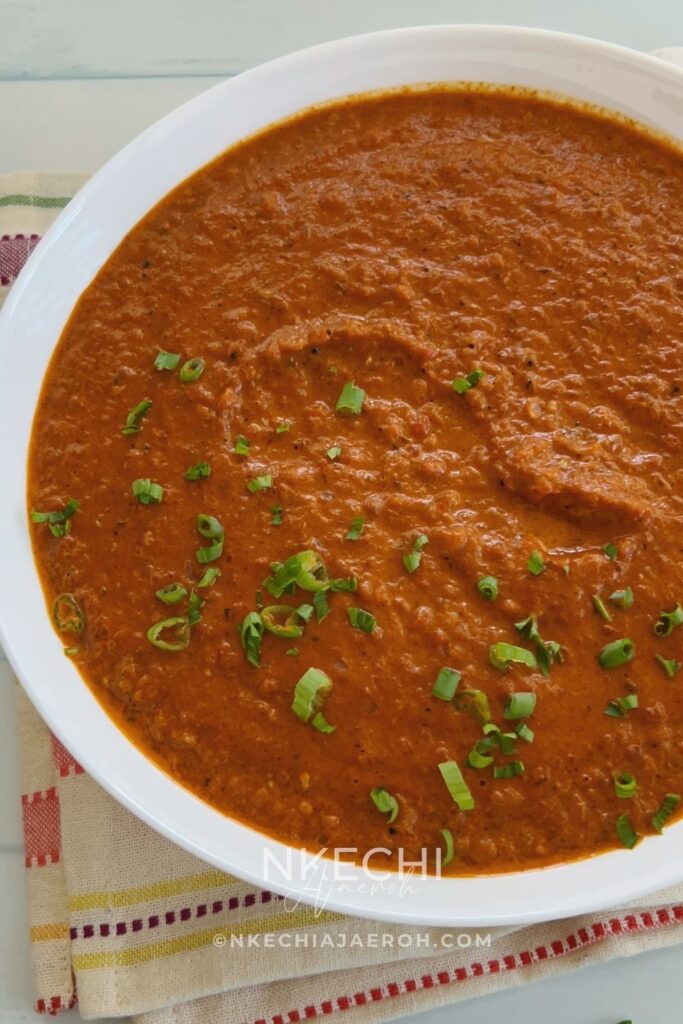 This homemade, authentic African peri peri sauce recipe is bold, smoky, and perfectly spicy. Made with fresh vegetables and simple ingredients, it’s easy, healthy, and incredibly versatile. Save this easy homemade peri peri sauce recipe! Made with fresh peppers, tomatoes, and bold spices, this African-inspired sauce is smoky, spicy, and perfect for chicken, veggies, and meal prep. Skip store-bought and make your own healthy peri peri sauce at home. Great for air fryer meals, marinades, and flavorful dinners!