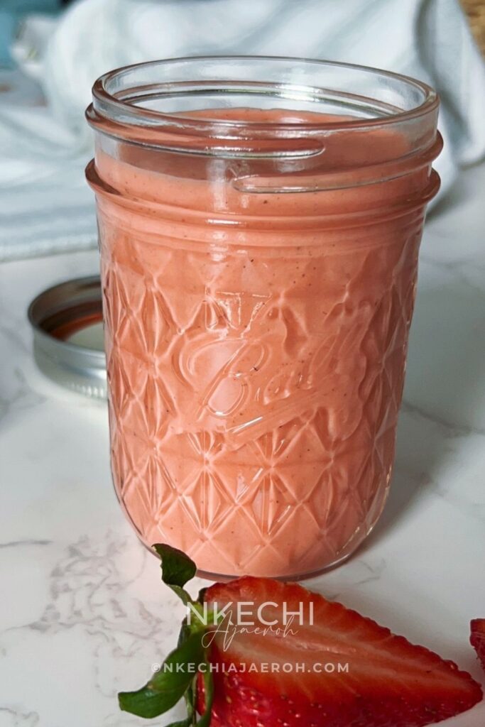 This Fresh Strawberry Salad Dressing is sweet, tangy, and creamy, made with real strawberries, extra-virgin olive oil, apple cider vinegar, honey, and monk fruit. Inspired by the flavors of CAVA, this easy homemade dressing comes together in just 5 minutes and is perfect for green salads, salmon salads, quinoa bowls, and fresh summer recipes. Once you try this healthy strawberry dressing, you'll never want bottled dressing again!