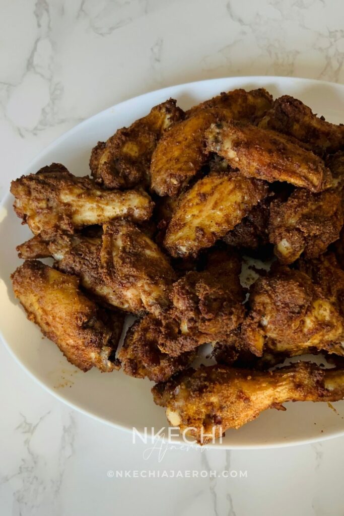Nigerian suya is one of those authentic Nigerian foods you have to try at least once in your lifetime. It is so distinct and different from just about any other spicy meat recipe you may have had. One of the best things about Nigerian suya is that you can make it with different types of meat: beef (the original), chicken, turkey, pork, or even goat meat. Personally, I make chicken suya the most. Make sure to check out my Chicken Breast Suya Skewers, and for all my wings-loving friends, this Air Fryer Nigerian Suya Chicken Wings is for you! The best part? These wings cook quickly and easily in the air fryer.
