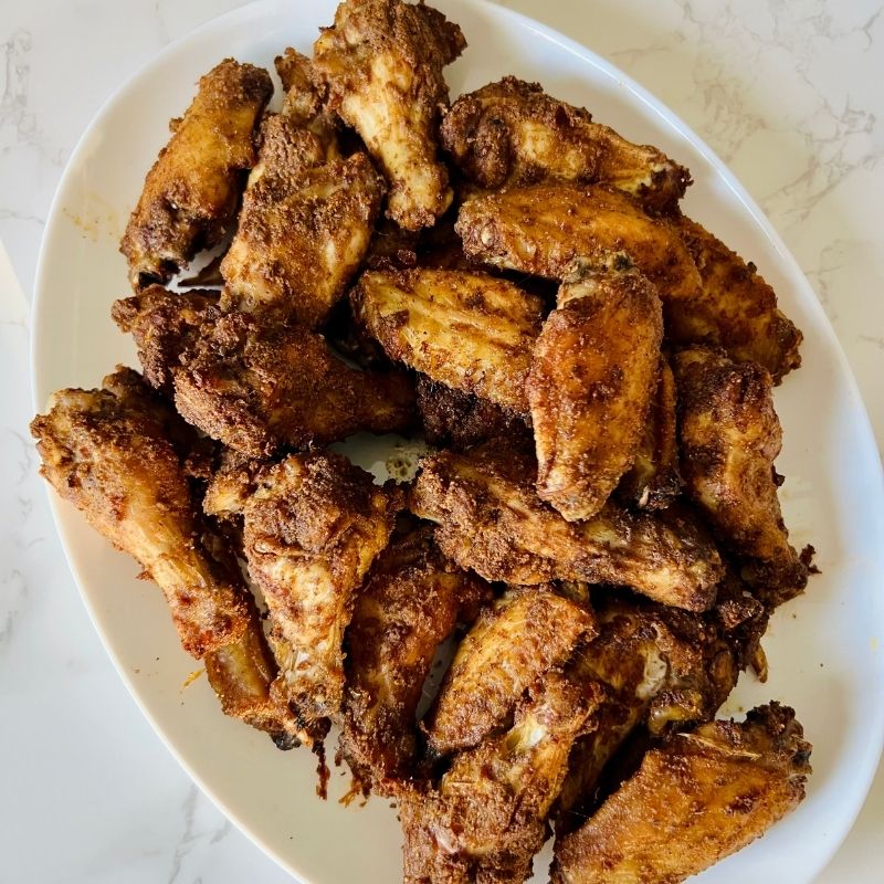 These Air Fryer Nigerian Suya Chicken Wings are juicy, crispy, spicy, and generously seasoned with authentic yaji. Serve them 9ja-style with fresh onions and tomatoes, as an appetizer, or alongside jollof rice for an easy, flavor-packed meal.