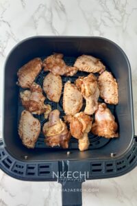 These Air Fryer Nigerian Chicken Suya Wings are juicy, crispy, spicy, and loaded with authentic 9ja flavor! Chicken wings are generously seasoned with yaji/suya pepper and air-fried until perfectly cooked and crisp. Serve these easy Nigerian suya wings with fresh onions and tomatoes, enjoy them as an appetizer, or pair them with jollof rice for dinner. A must-try Nigerian chicken recipe for suya lovers!