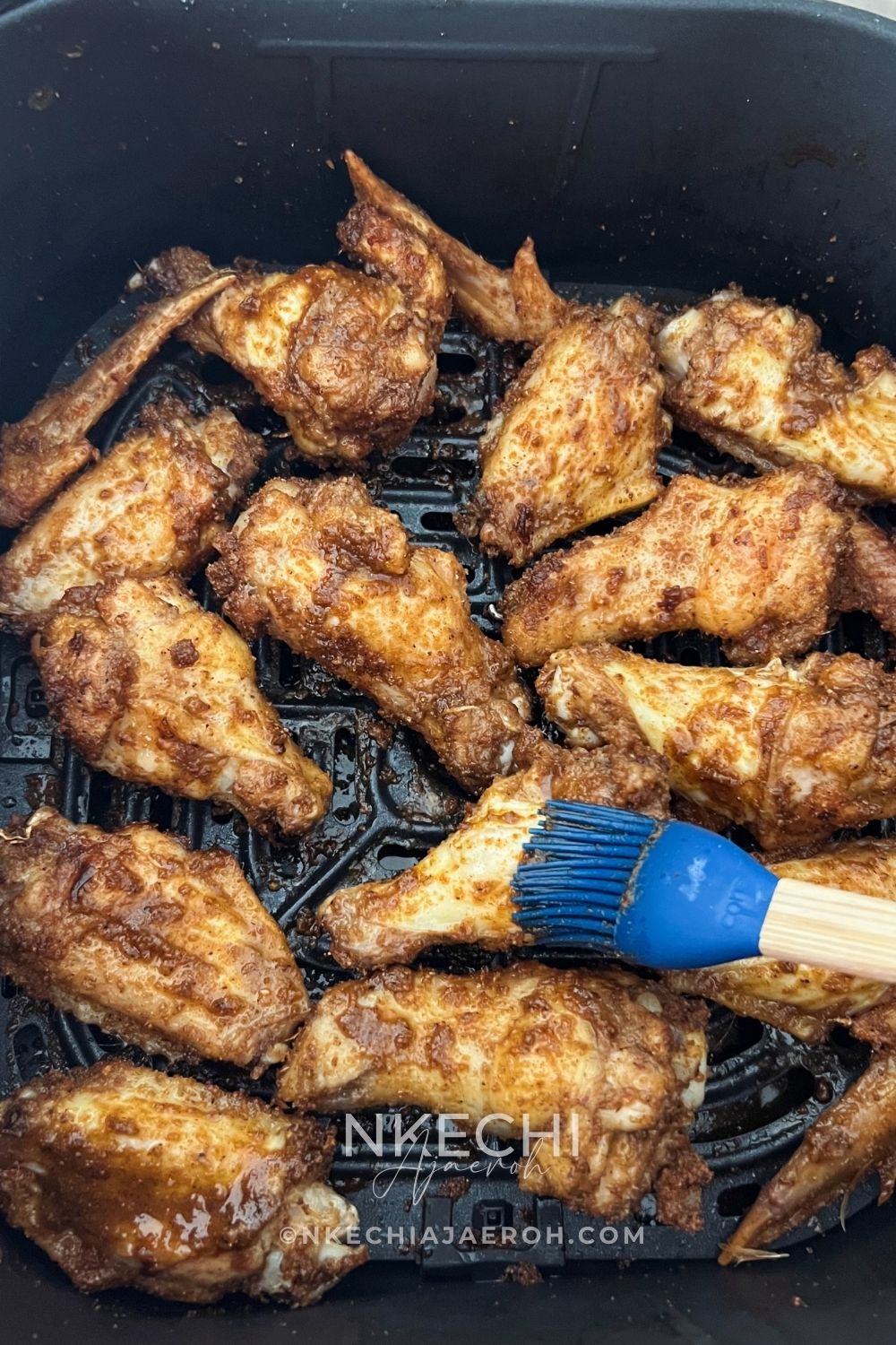 These Air Fryer Nigerian Chicken Suya Wings are juicy, crispy, spicy, and loaded with authentic 9ja flavor! Chicken wings are generously seasoned with yaji/suya pepper and air-fried until perfectly cooked and crisp. Serve these easy Nigerian suya wings with fresh onions and tomatoes, enjoy them as an appetizer, or pair them with jollof rice for dinner. A must-try Nigerian chicken recipe for suya lovers!