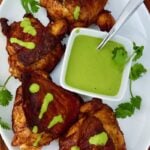 These Air Fryer Peruvian Chicken Thighs are juicy, beautifully seasoned, and packed with flavor! Marinated with ají amarillo paste, lime, garlic, soy sauce, and warm spices, then air-fried until deliciously golden. Serve with creamy homemade aji verde sauce for an easy, flavorful chicken dinner that's perfect for family meals or entertaining.