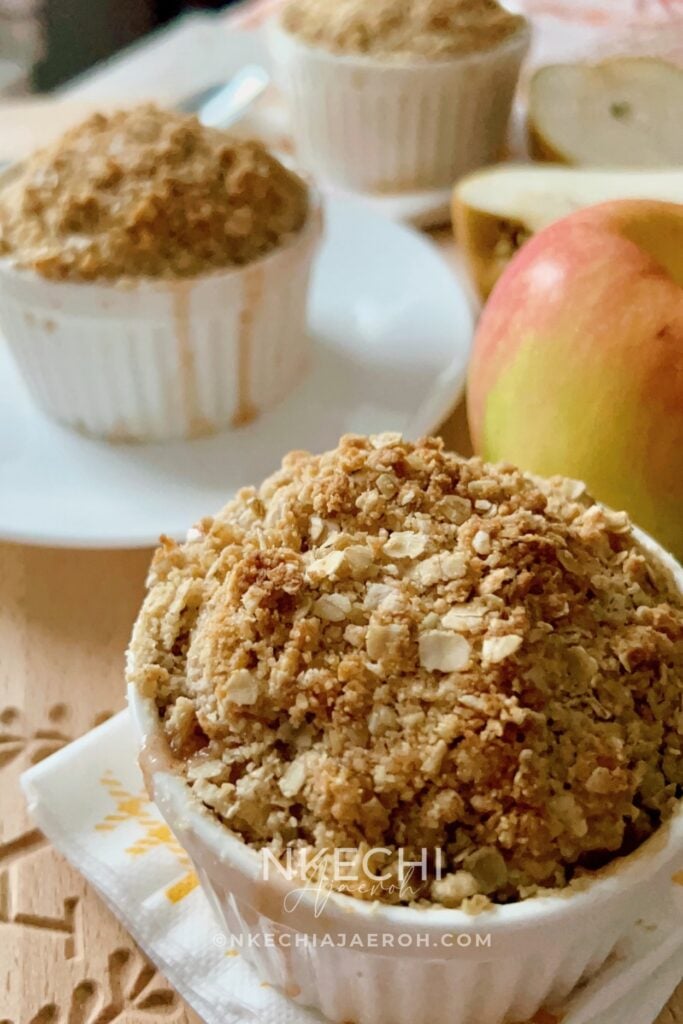 This easy Apple Pear Crisp is the cozy fruit dessert you'll want all fall and winter! Juicy apples and pears, tart dried cranberries, fresh citrus, cinnamon, and nutmeg are baked under a buttery oat crumble until golden and bubbly. Make individual apple pear crisps in ramekins for family dinner, Thanksgiving, Christmas, or an easy cold-weather dessert.