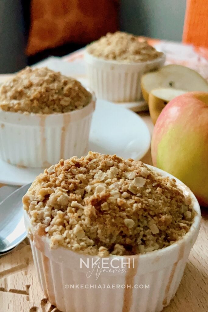 This easy Individual Apple Pear Crisp with Cranberries combines juicy pears, crisp apples, dried cranberries, citrus, and warm spices under a buttery oat topping. Baked in individual ramekins, this cozy fall and winter dessert is perfect for family dinners, Thanksgiving, Christmas, and holiday entertaining!
