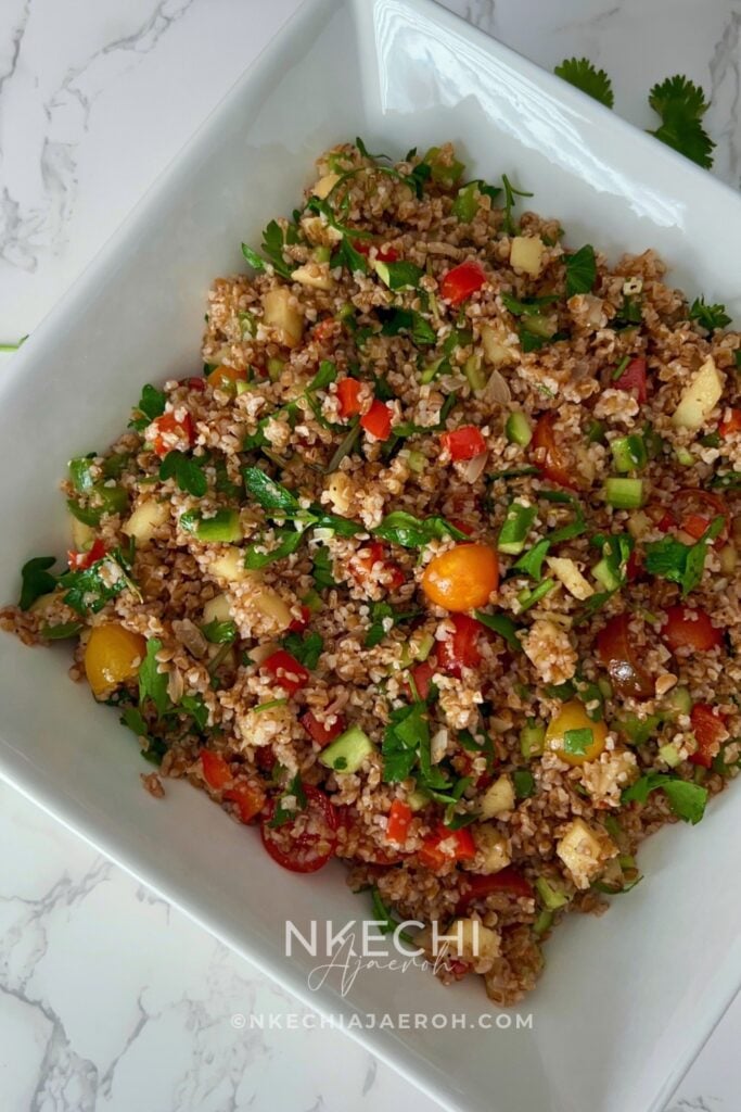 Looking for an easy, colorful Mediterranean Bulgur Salad? This delicious bulgur wheat salad combines nutty red bulgur, crisp vegetables, sweet apples, fresh parsley, and a zesty lemon date dressing with a touch of date syrup. Naturally dairy-free and made without feta, it's perfect for healthy meal prep, weekday lunches, family dinners, or serving alongside chicken, salmon, or lamb. A fresh, nourishing Mediterranean grain salad that's easy to customize with your favorite vegetables. Save this recipe for later! 
