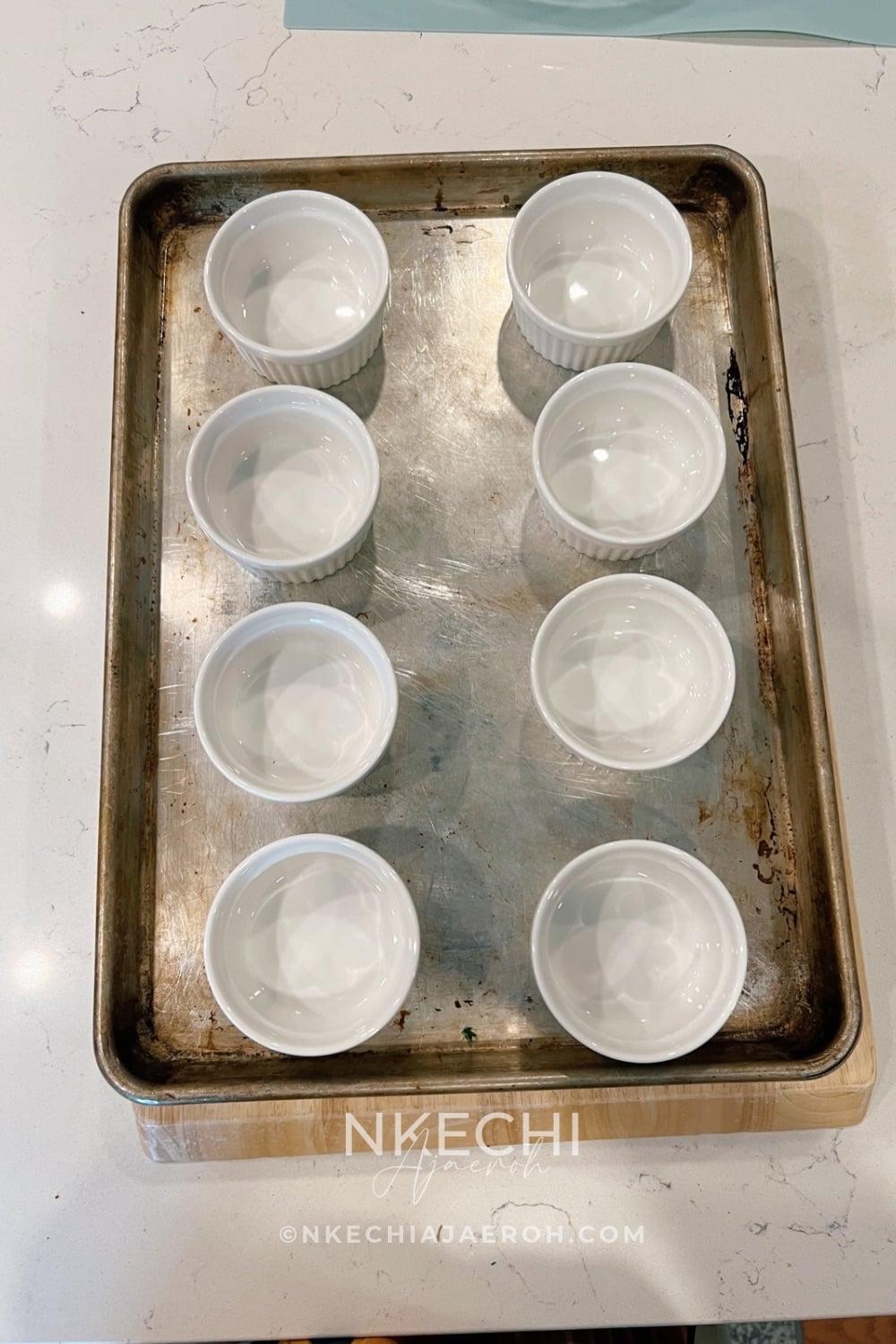 If you're using individual ramekins, place them on a large baking sheet. This makes them easier to transfer in and out of the oven and catches any bubbling fruit juices.